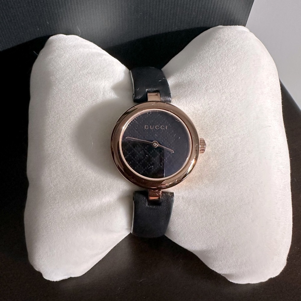 Women’s Gucci watch.